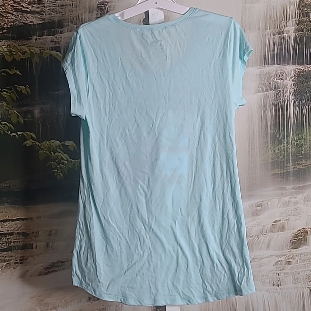 Justice Girls 20 teal short sleeve coffee and latte Tshirt